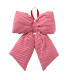 Large red and white striped fabric Christmas bow – 59 × 11.5 × 53 cm